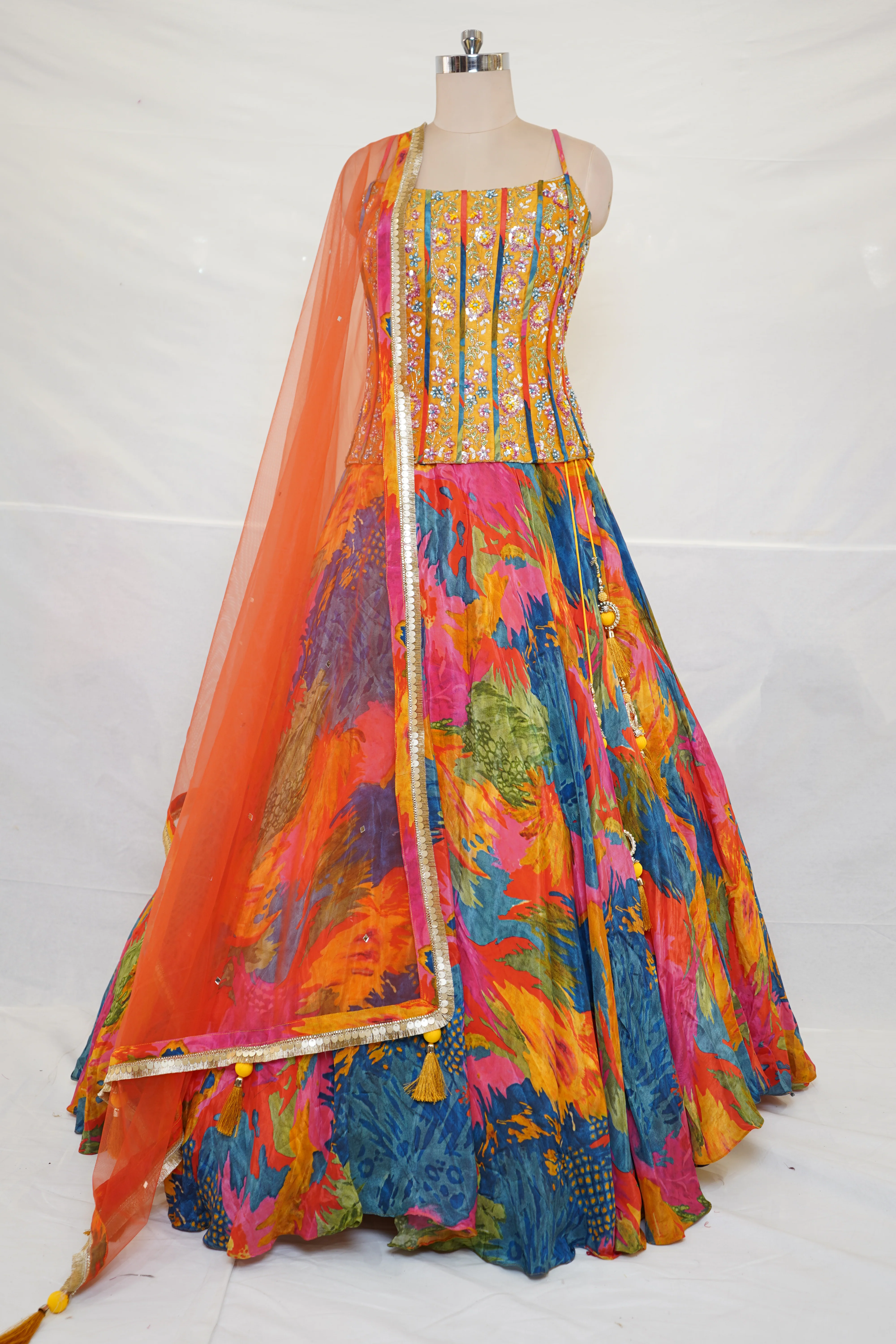 Abstract Multicolor Printed Lehenga Set with Embroidered Bustier & Orange Dupatta - Image 7