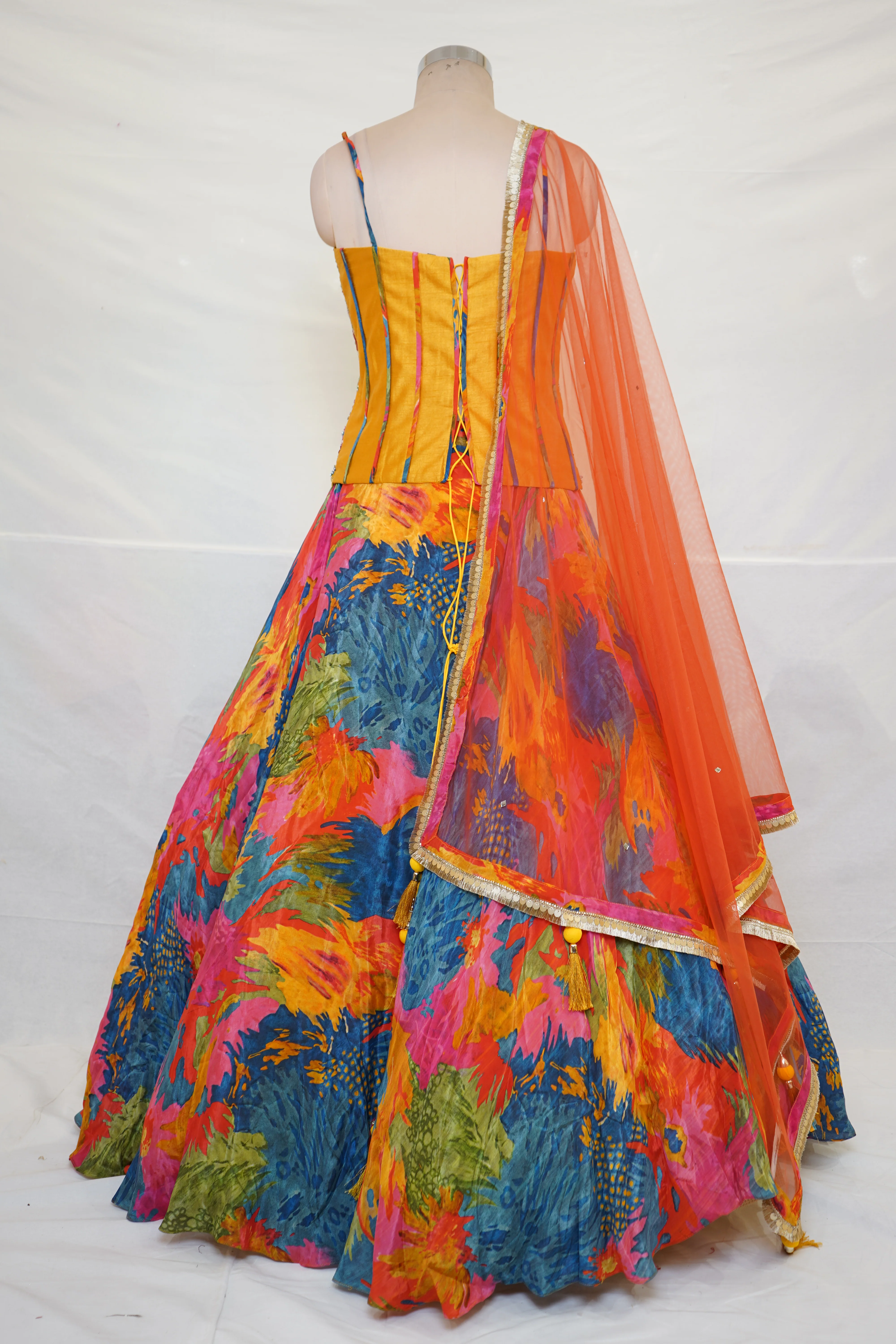 Abstract Multicolor Printed Lehenga Set with Embroidered Bustier & Orange Dupatta - Image 8