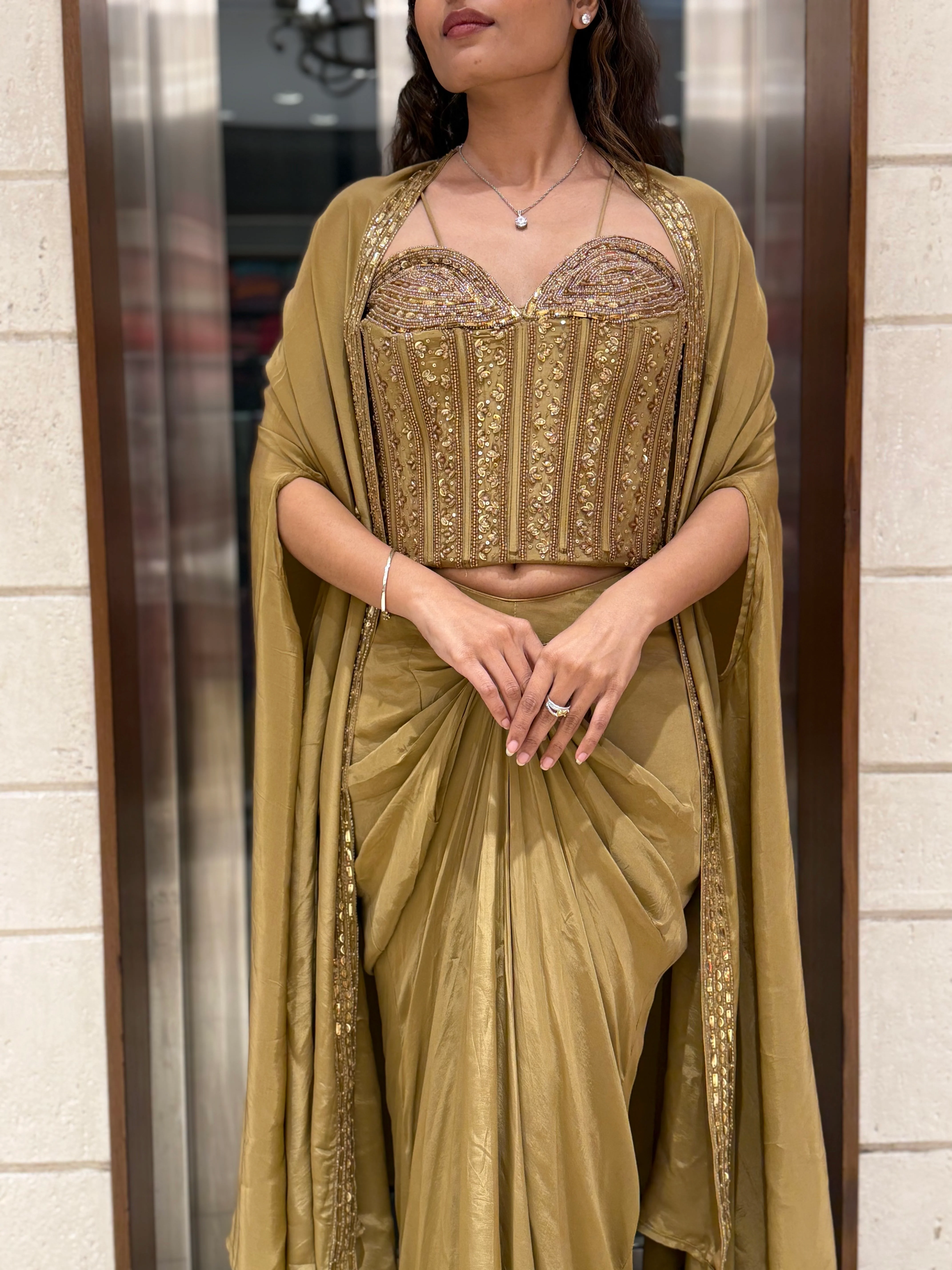 Champagne Gold Draped Saree Set with Embroidered Corset Blouse & Cape - Image 2