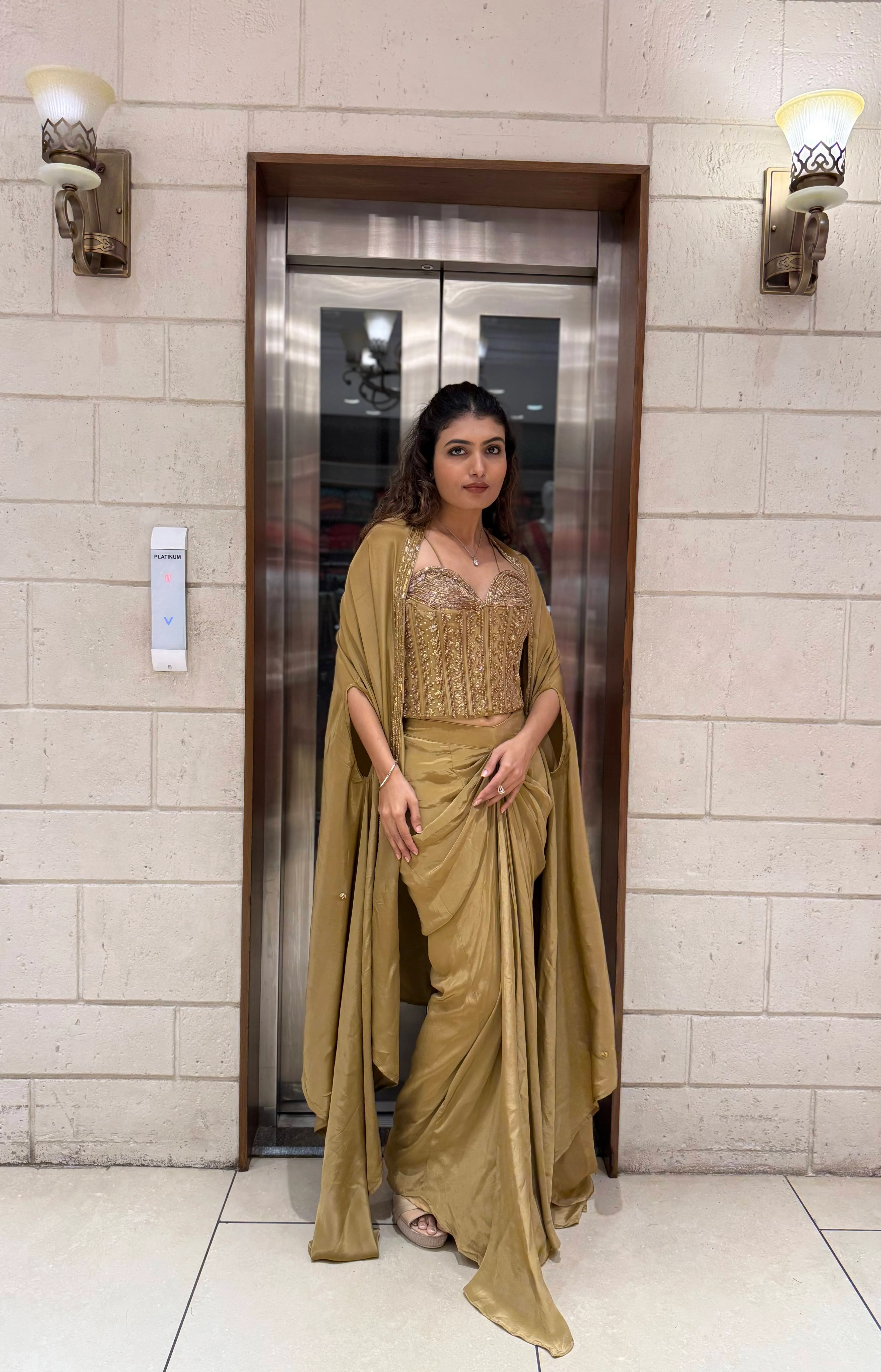 Champagne Gold Draped Saree Set with Embroidered Corset Blouse & Cape - Image 3