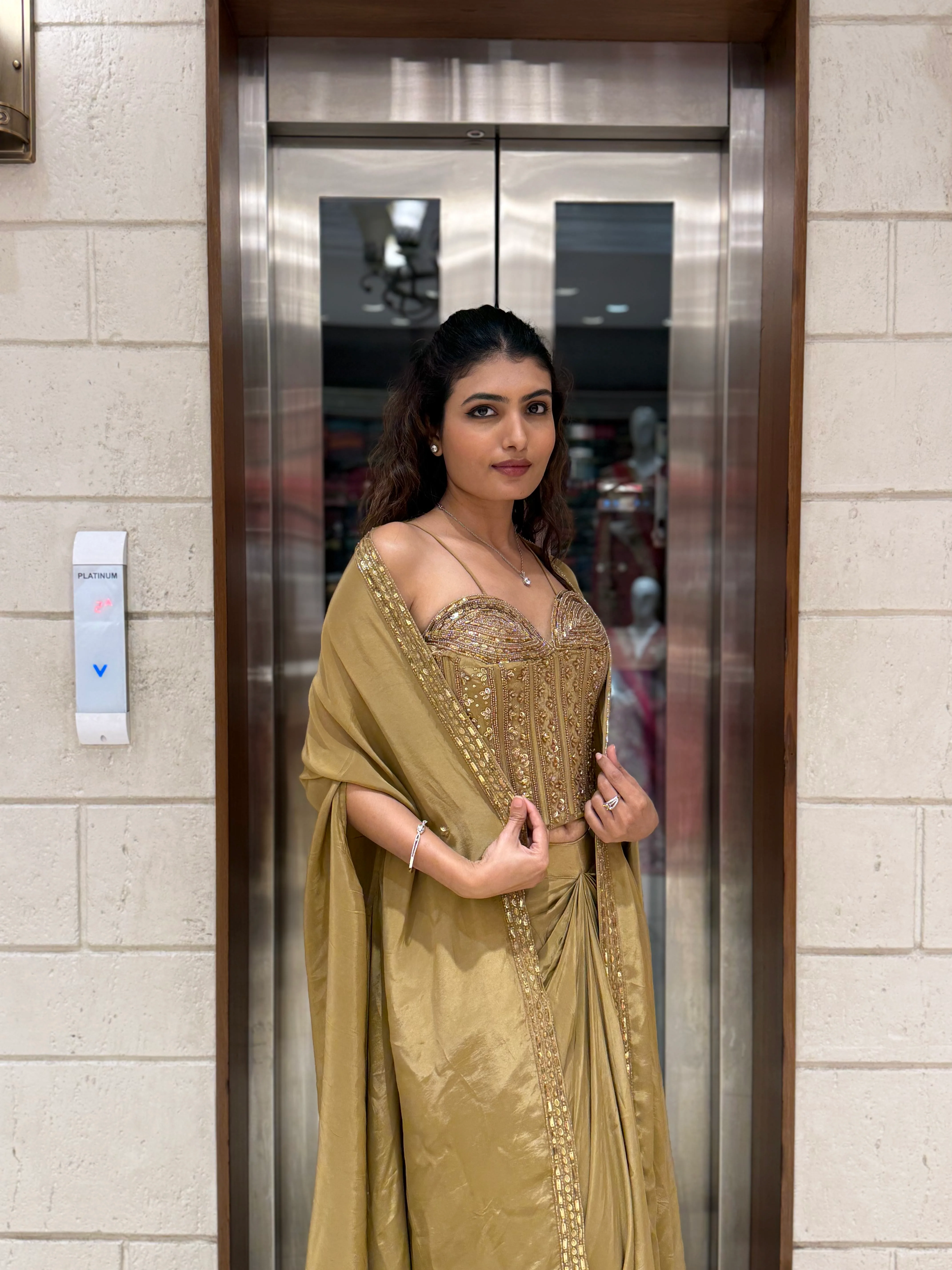 Champagne Gold Draped Saree Set with Embroidered Corset Blouse & Cape - Image 4