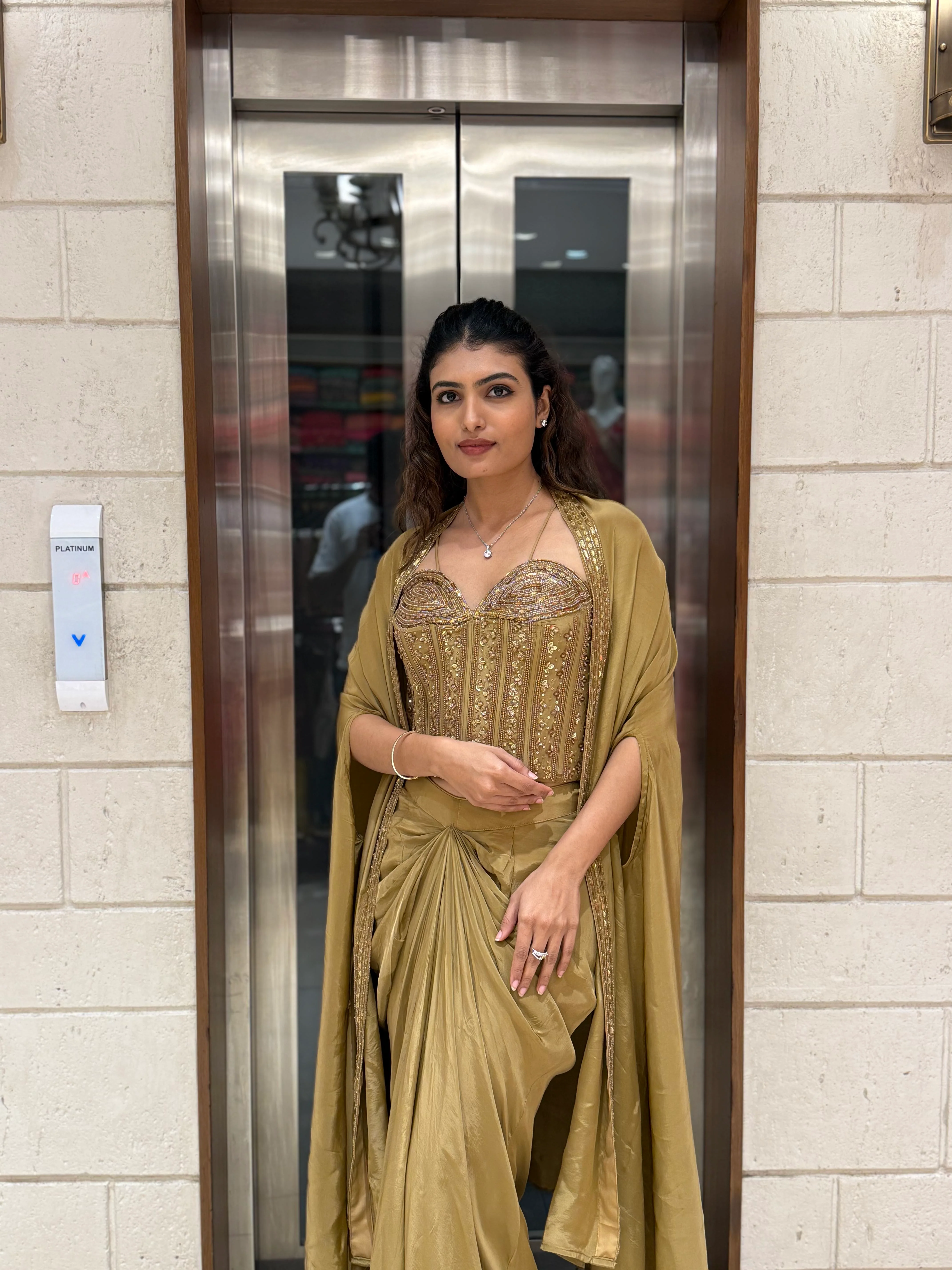 Champagne Gold Draped Saree Set with Embroidered Corset Blouse & Cape - Image 7