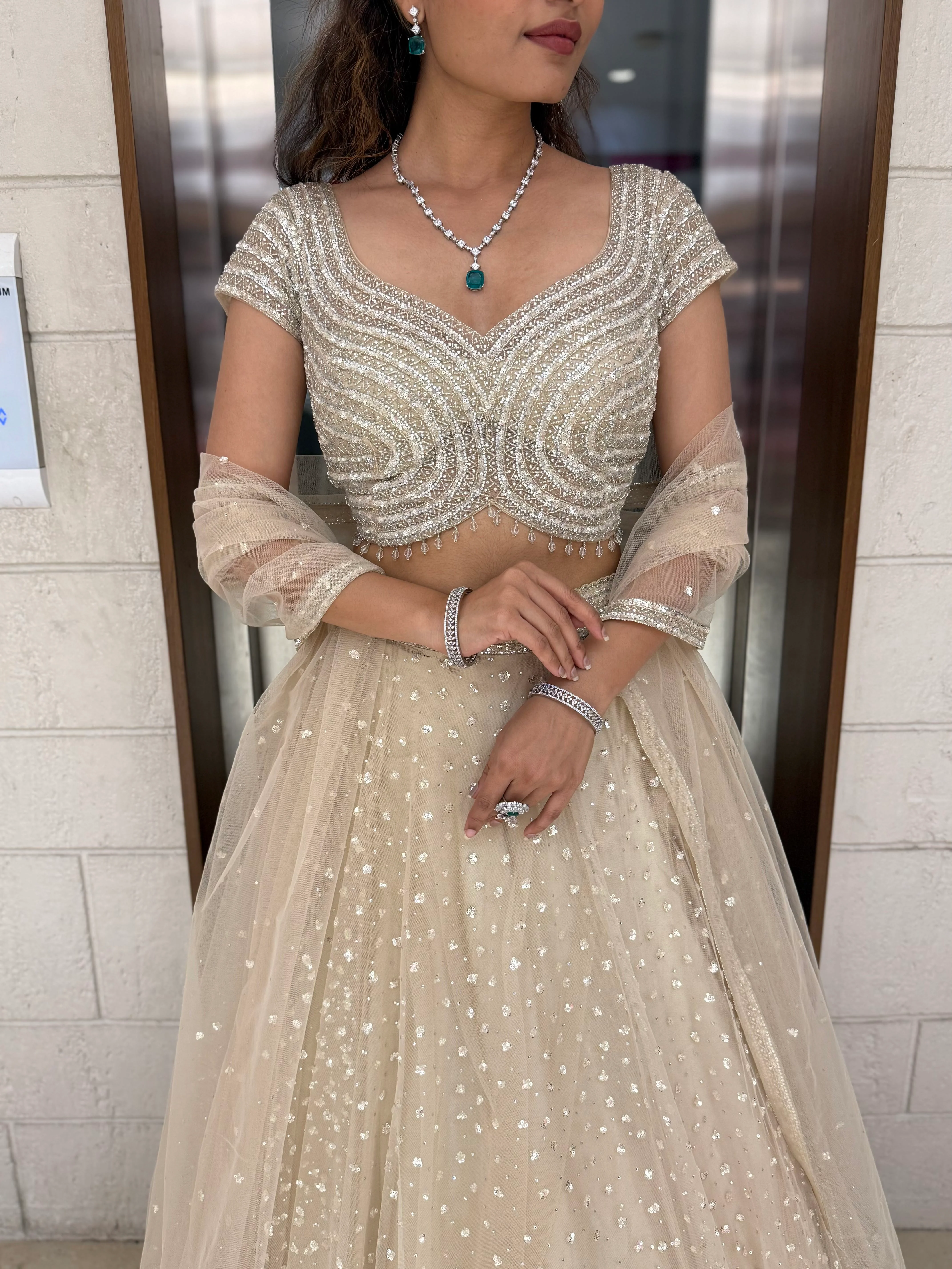 Champagne Sequin Embellished Lehenga with Wave Pattern Blouse & Sheer Dupatta - Image 2
