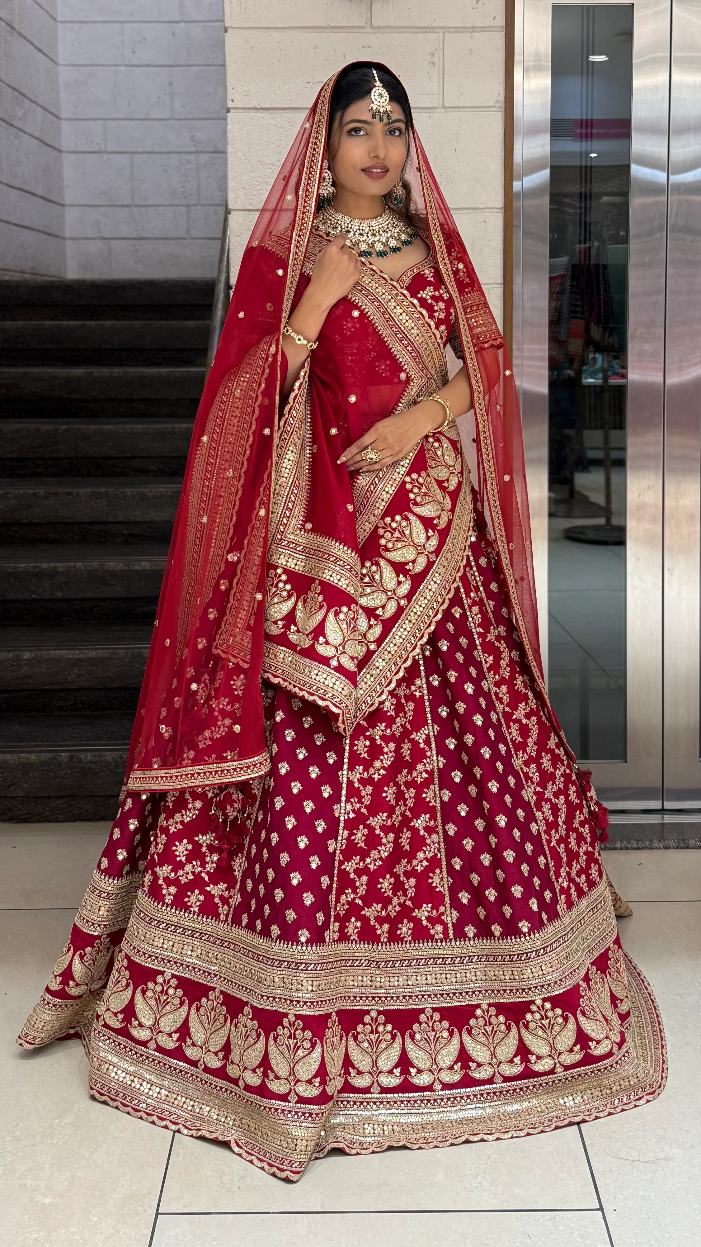 Crimson Red Heavy Embroidered Bridal Lehenga Choli with Gold Zari Work & Double Dupatta - Image 4