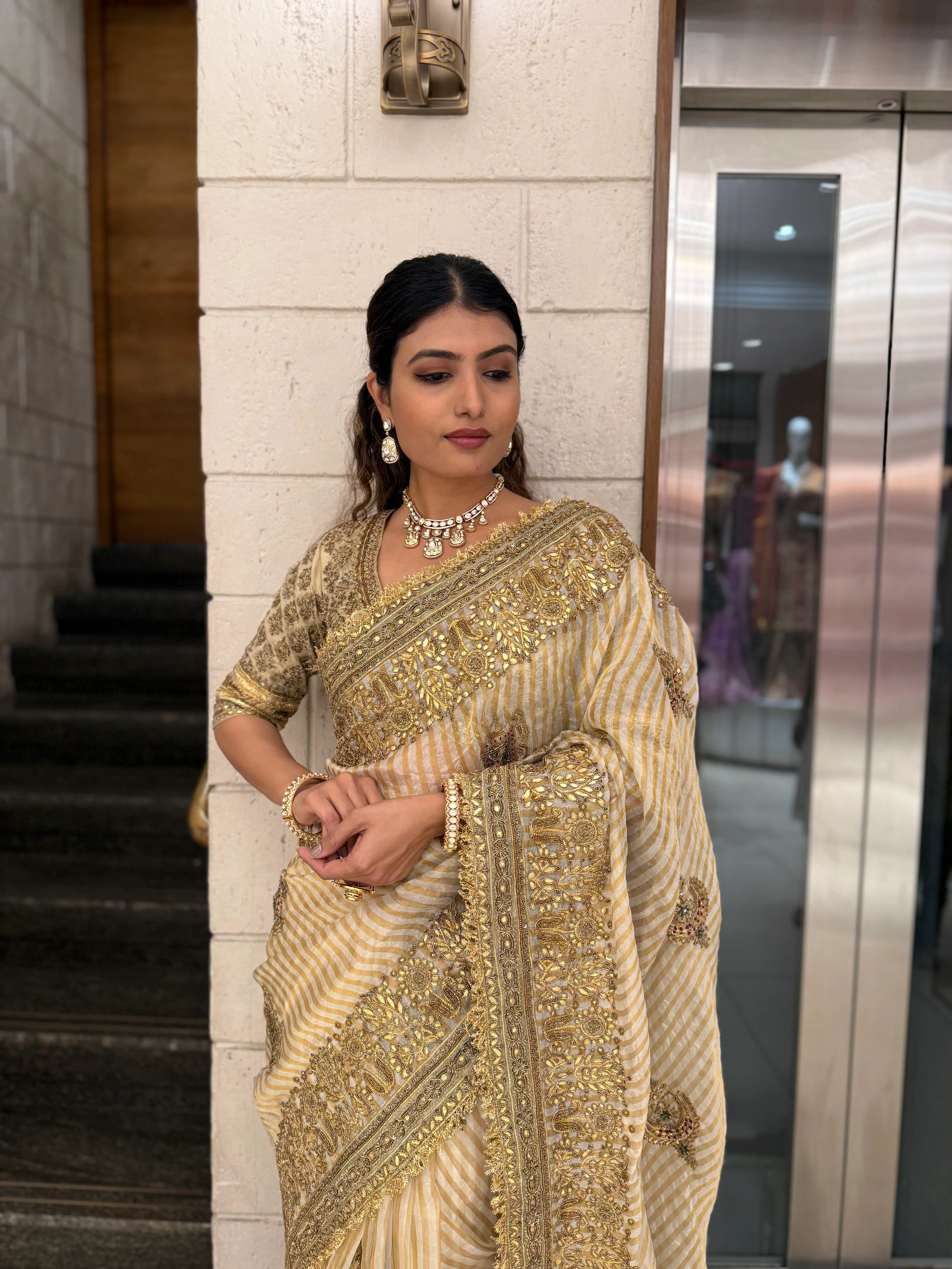 Elegant Beige & Gold Hand-Embellished Designer Saree with Heavy Zari Border - Image 3