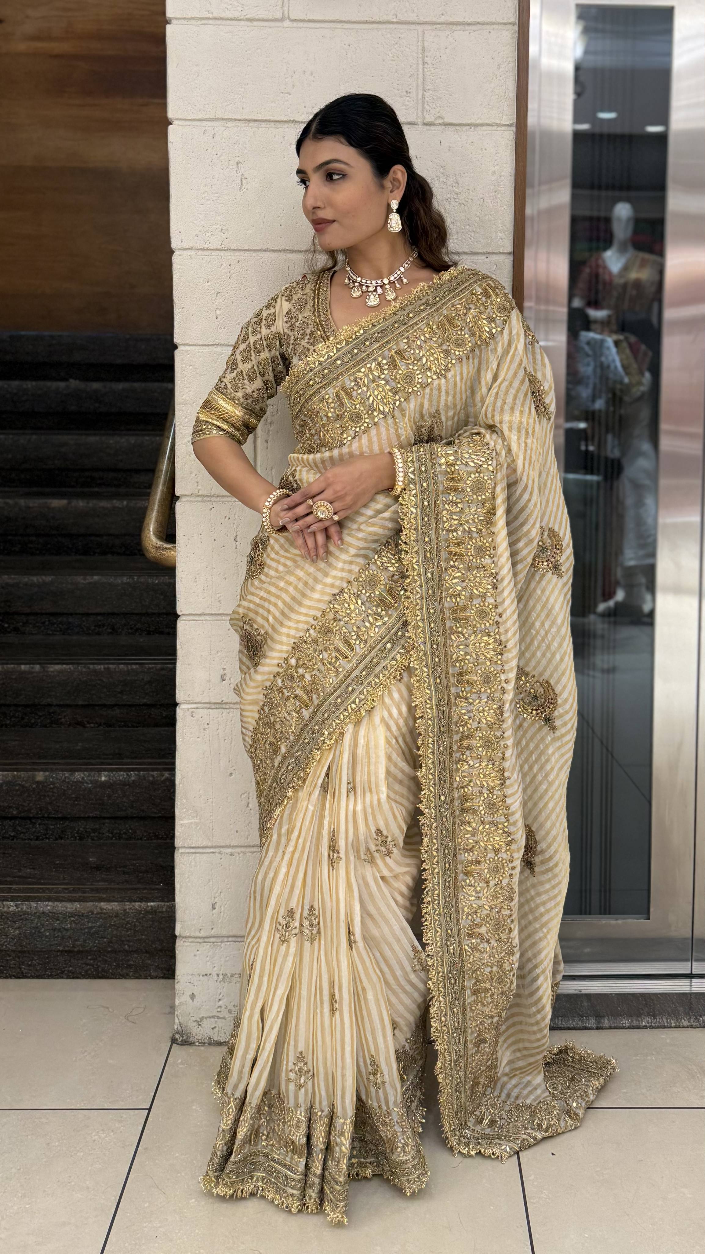Elegant Beige & Gold Hand-Embellished Designer Saree with Heavy Zari Border - Image 4