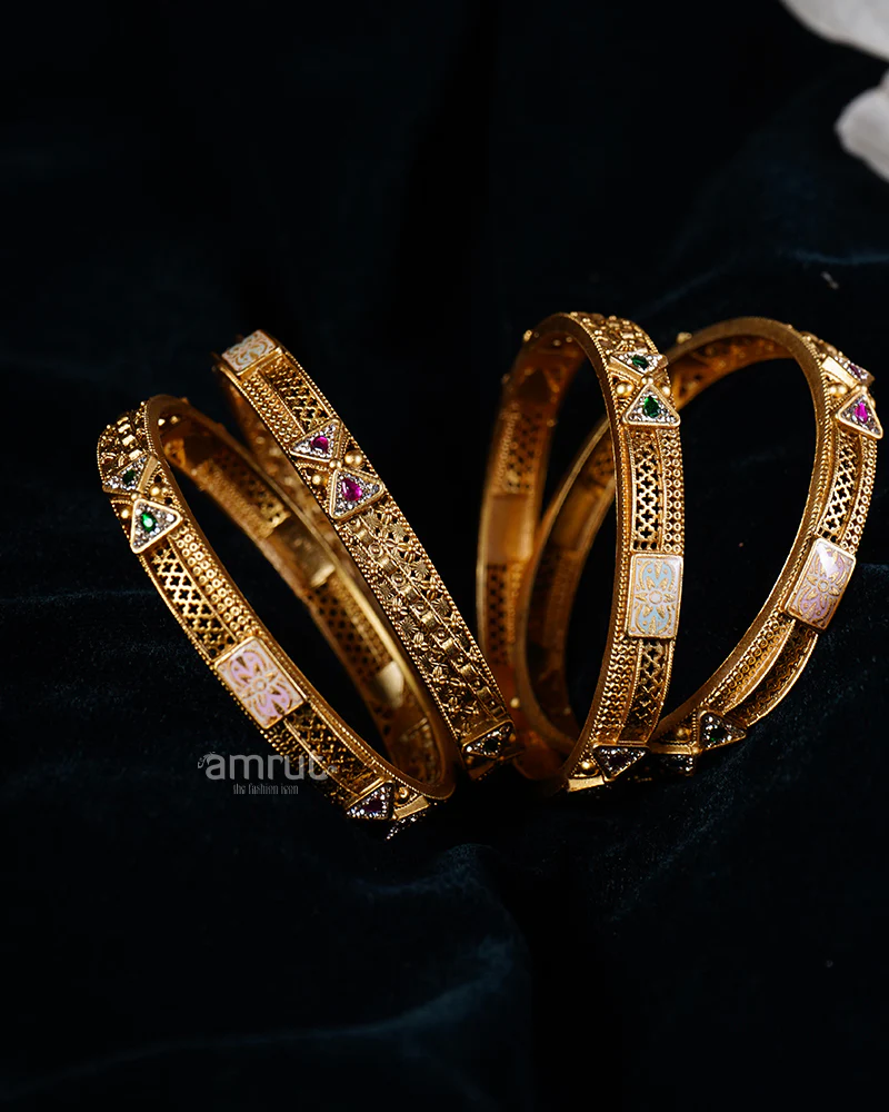 Gold Toned Bangle Set with Ruby, Emerald, and Opalescent Inlays - Image 2