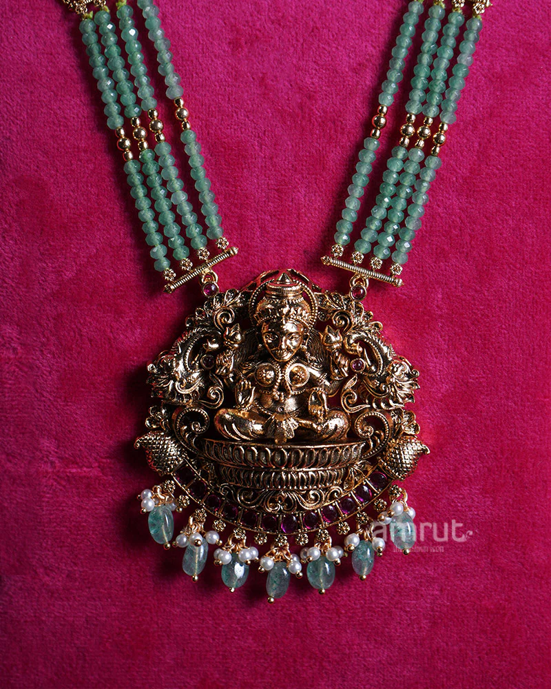 Gold-Toned Multi-Strand Necklace with Figure Pendant and Gemstones - Image 2