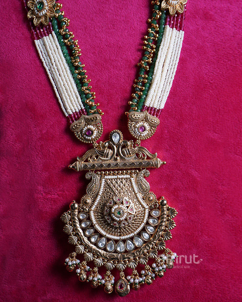 Gold Toned Multi Strand Necklace with Ornate Pendant and Matching Earrings - Image 2