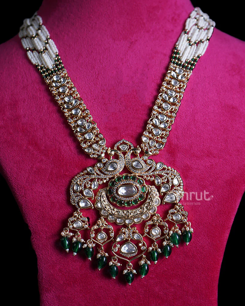 Gold Toned Peacock Necklace with White Stones and Emerald Green Accents - Image 2