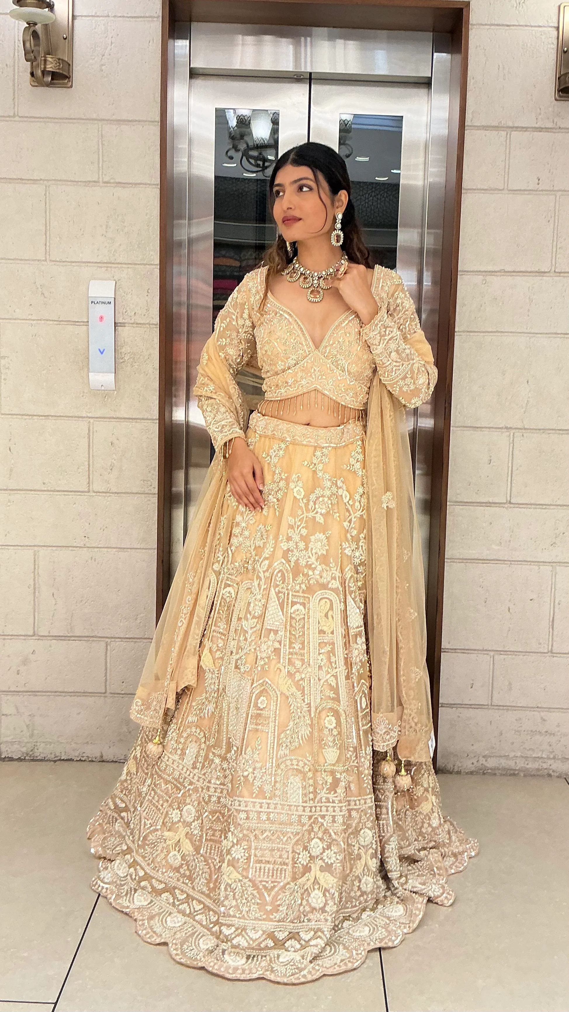 Ivory Champagne Heavy Embroidered Bridal Lehenga Choli with Net Dupatta - Image 3