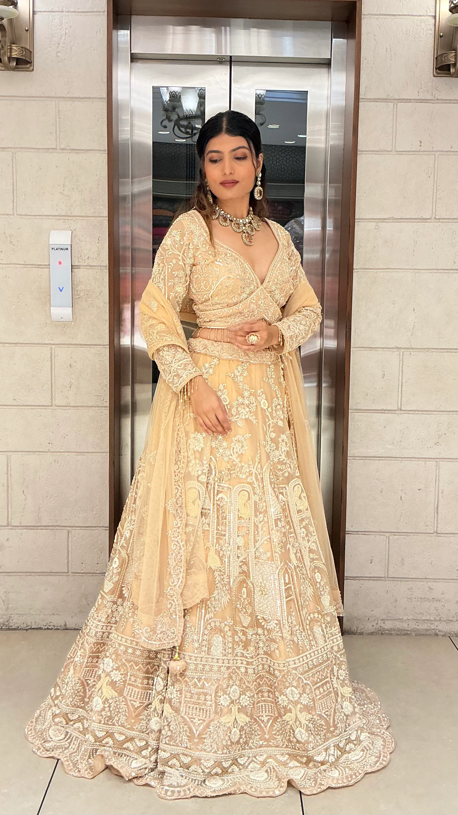 Ivory Champagne Heavy Embroidered Bridal Lehenga Choli with Net Dupatta - Image 4