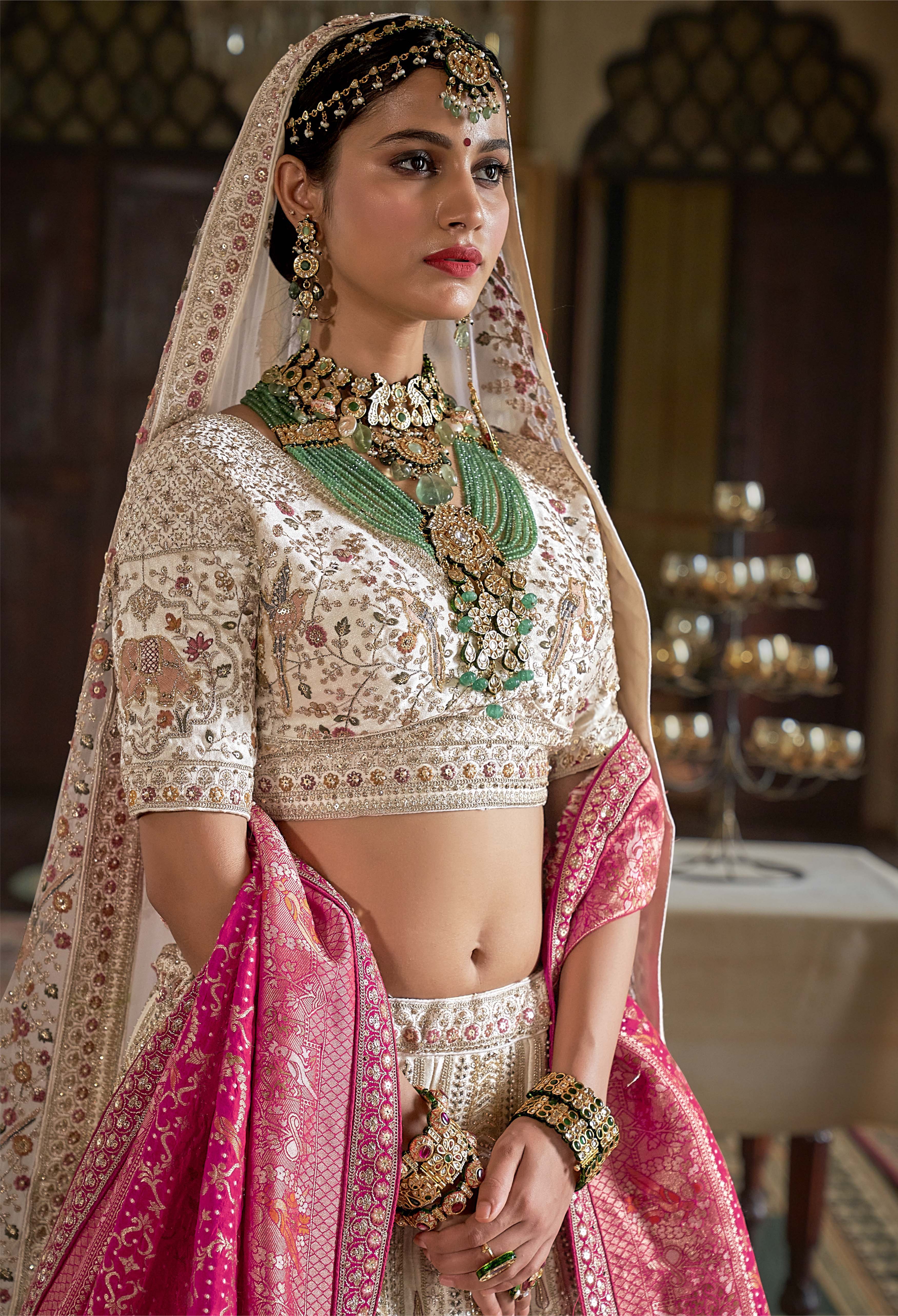 Ivory & Rose Handcrafted Bridal Lehenga with Zardozi and Elephant Motifs - Image 2
