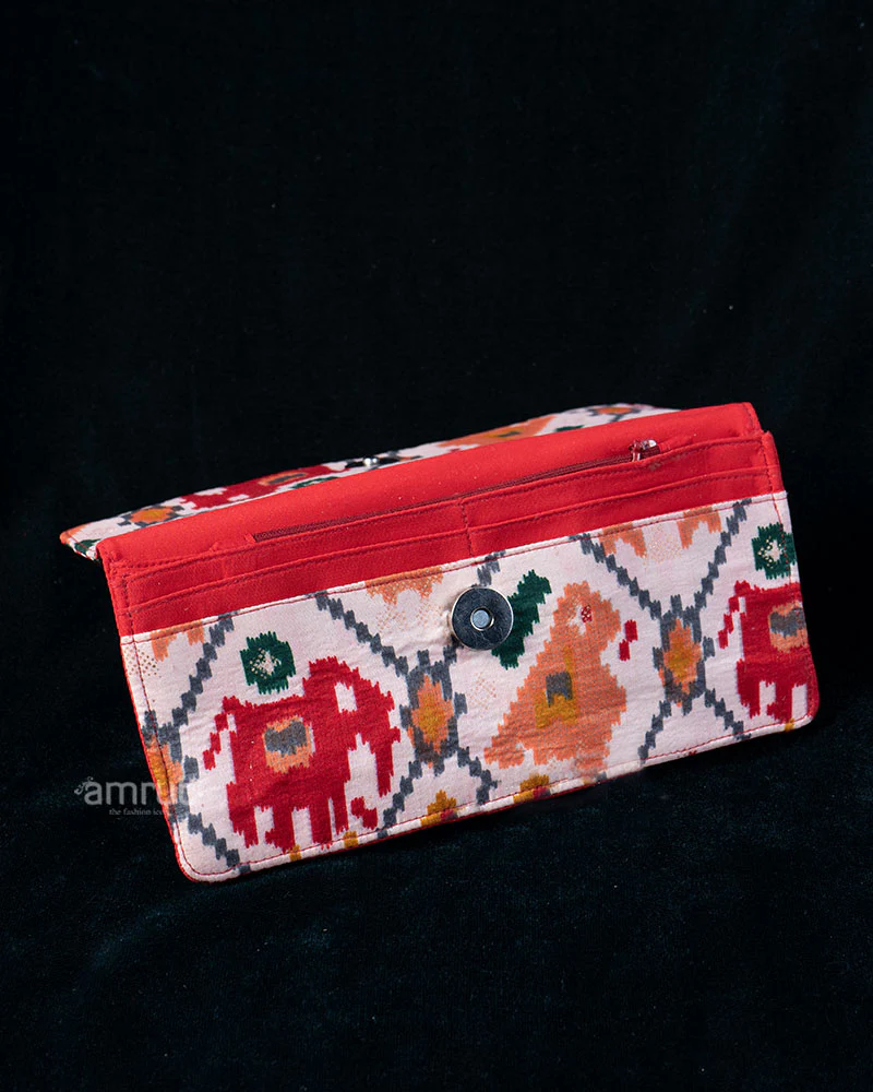 Red and Green Geometric Fold-Over Clutch with Floral Lining - Image 3