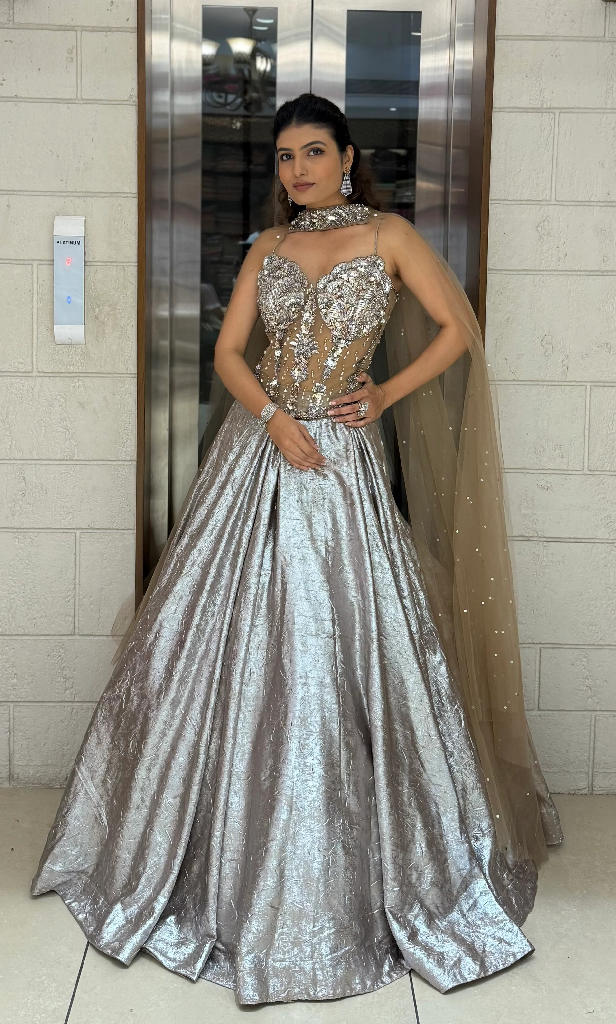 Metallic Silver Lehenga Choli with 3D Crystal Corset & Sheer Cape Dupatta - Image 2