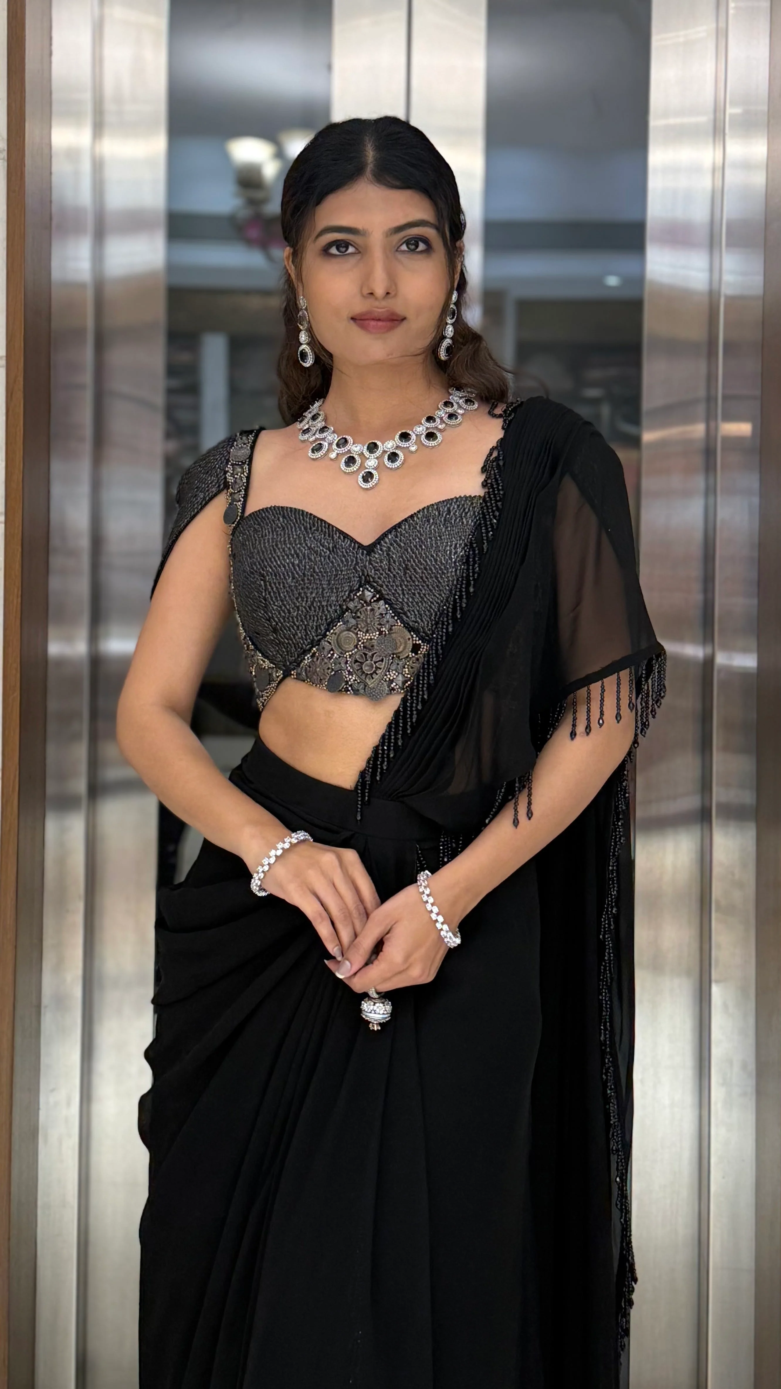 Midnight Black Pre-Draped Saree with Metallic Embellished Bustier Blouse - Image 4