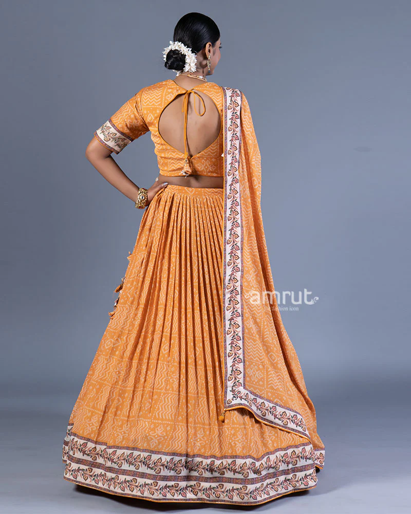 Mustard Orange Pleated Lehenga with Embroidered Cream Choli and Dupatta - Image 3