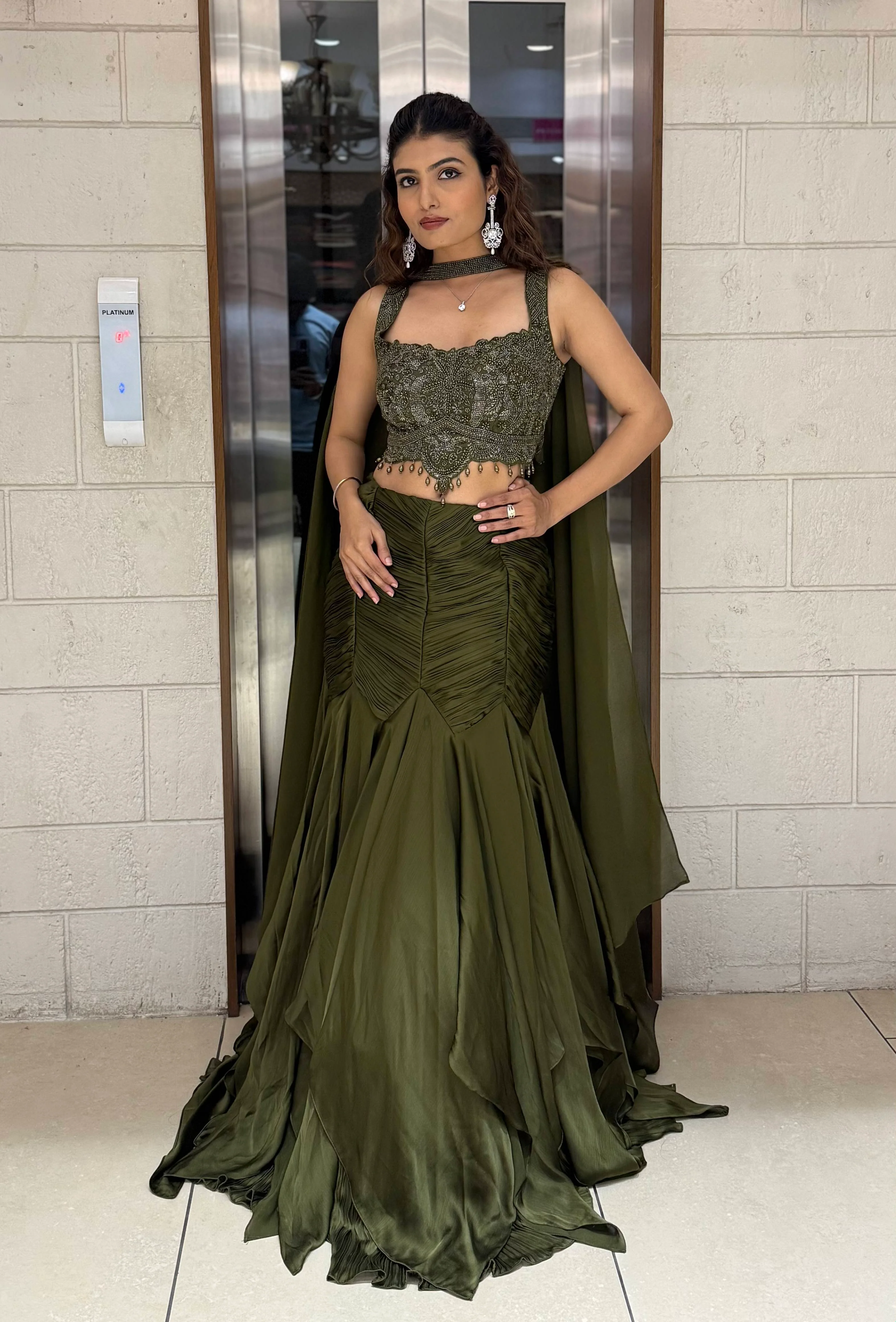 Olive Green Indo-Western Mermaid Gown with Embellished Corset & Draped Cape Sleeves - Image 4