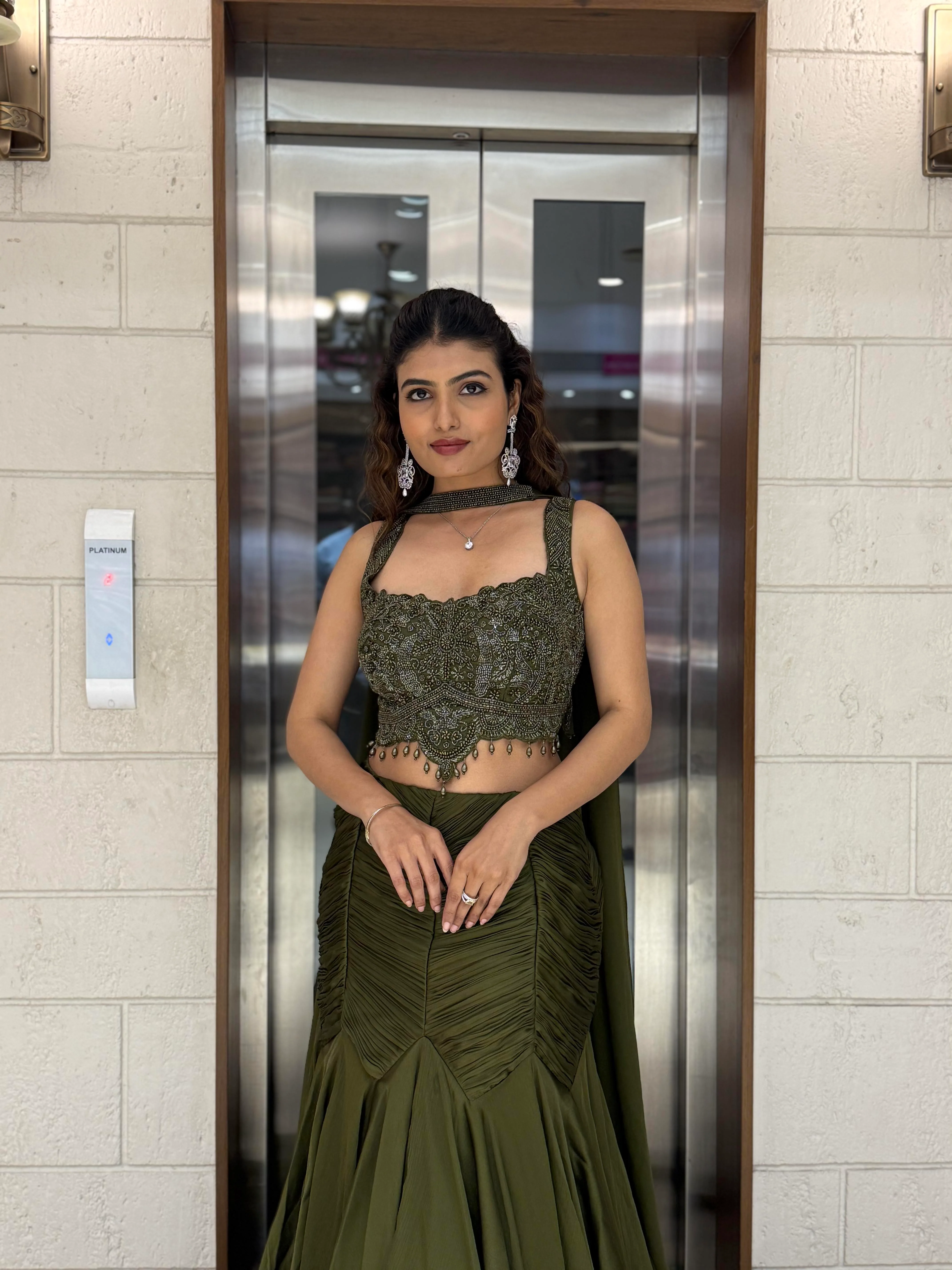 Olive Green Indo-Western Mermaid Gown with Embellished Corset & Draped Cape Sleeves - Image 6