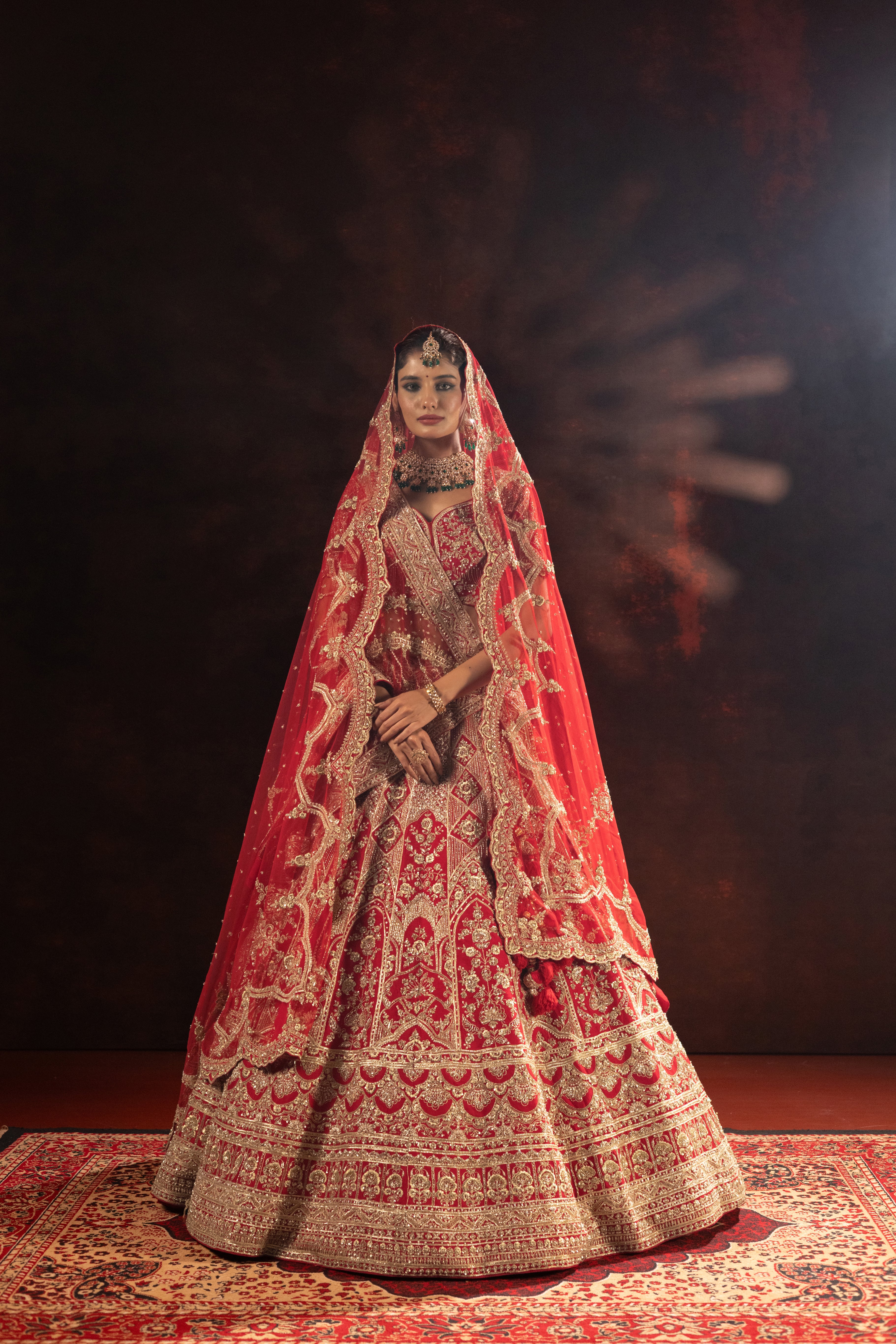 Royal Crimson Designer Bridal Lehenga with Heavy Gold Embroidery - Image 6