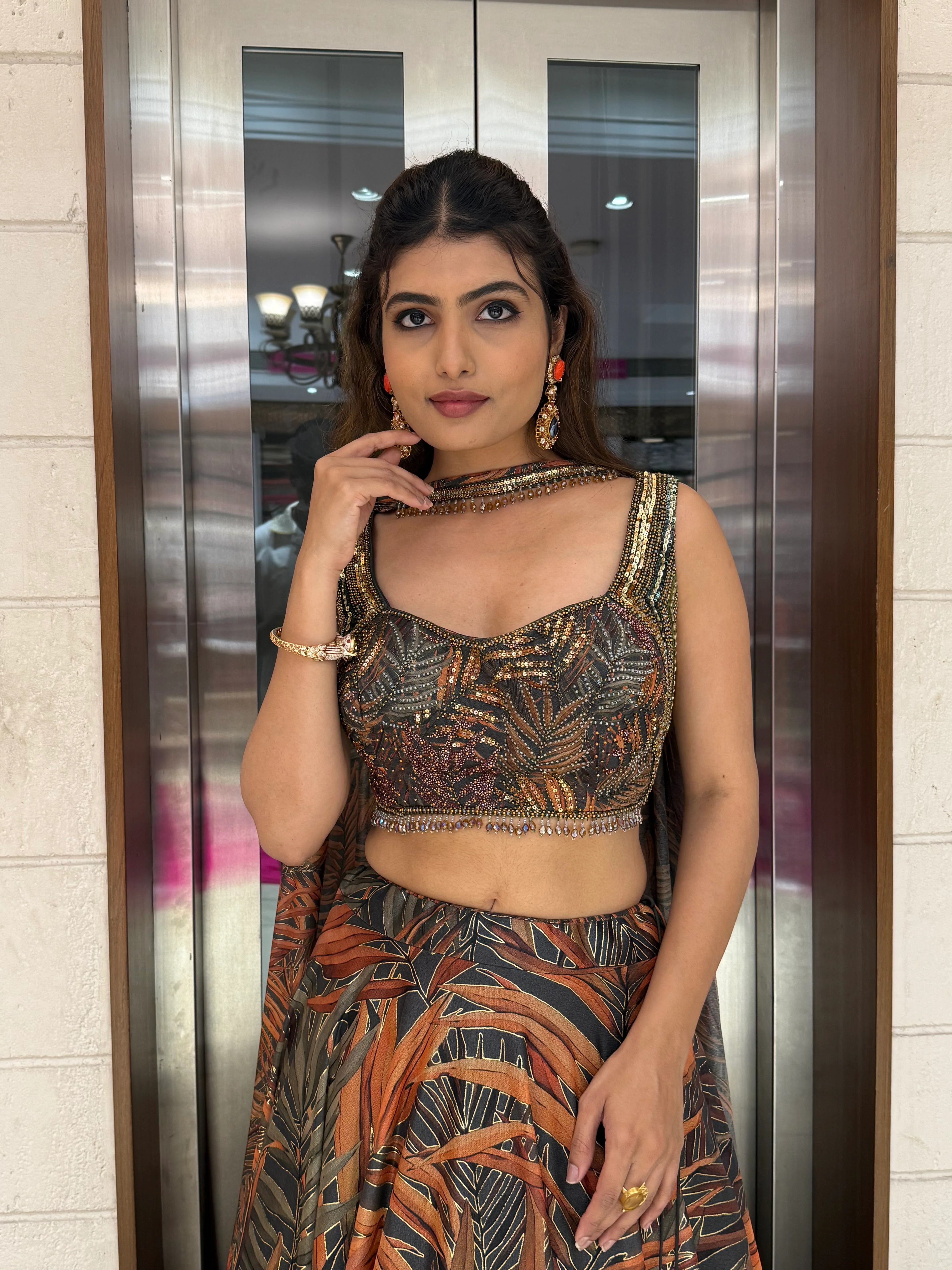 Rust Orange & Olive Leaf Print Lehenga with Embellished Blouse & Dupatta - Image 2