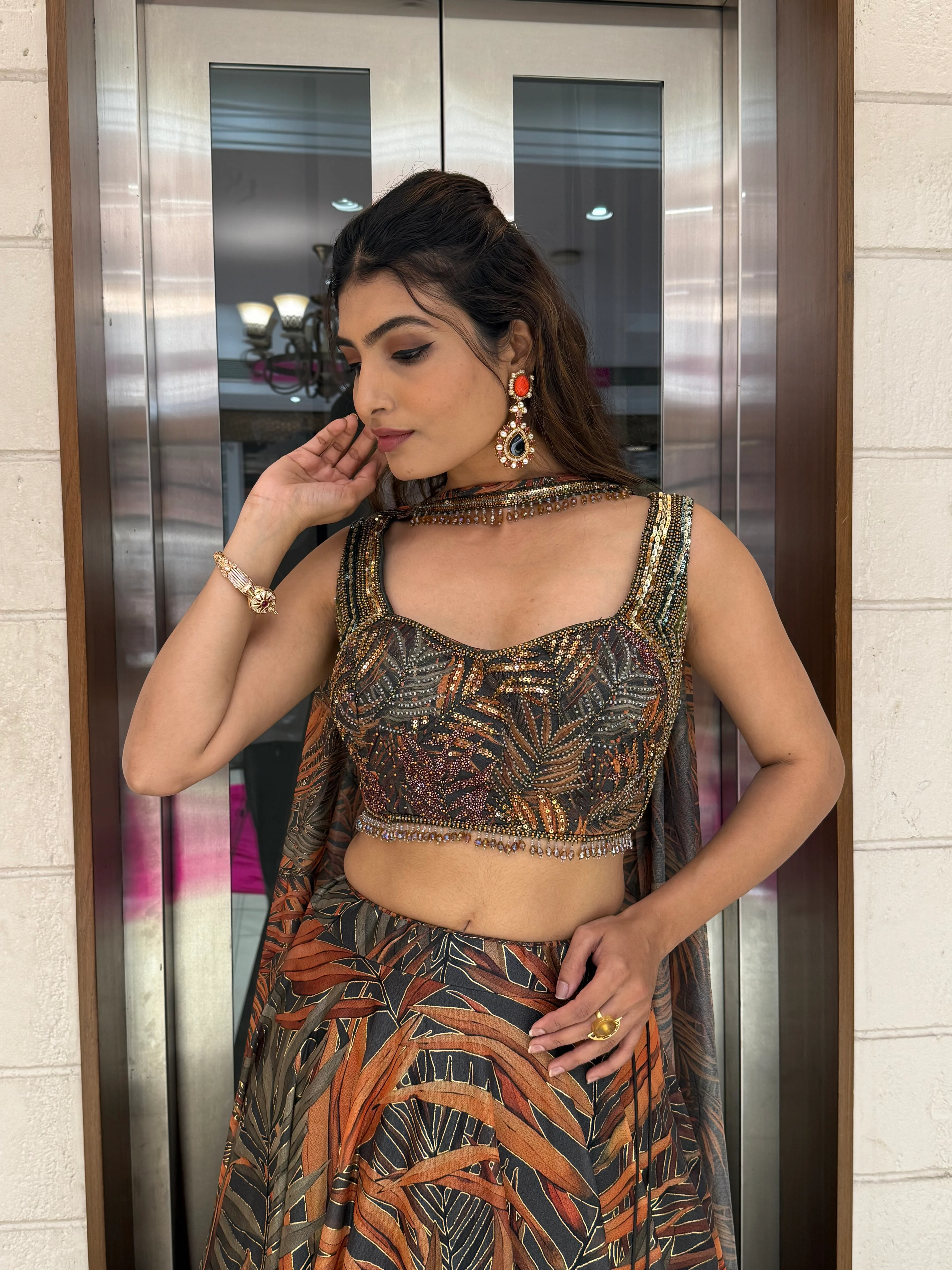 Rust Orange & Olive Leaf Print Lehenga with Embellished Blouse & Dupatta - Image 3