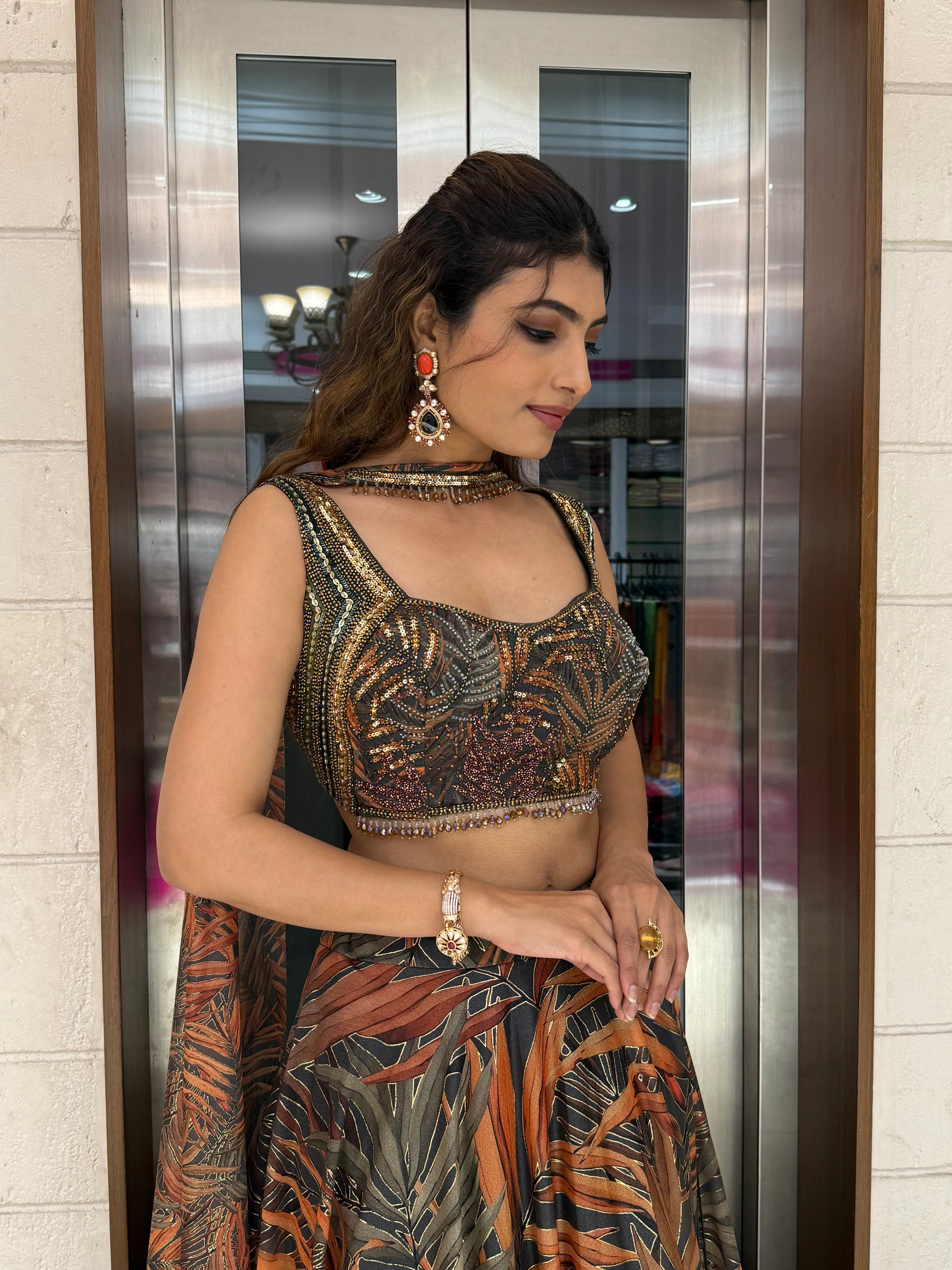Rust Orange & Olive Leaf Print Lehenga with Embellished Blouse & Dupatta - Image 4