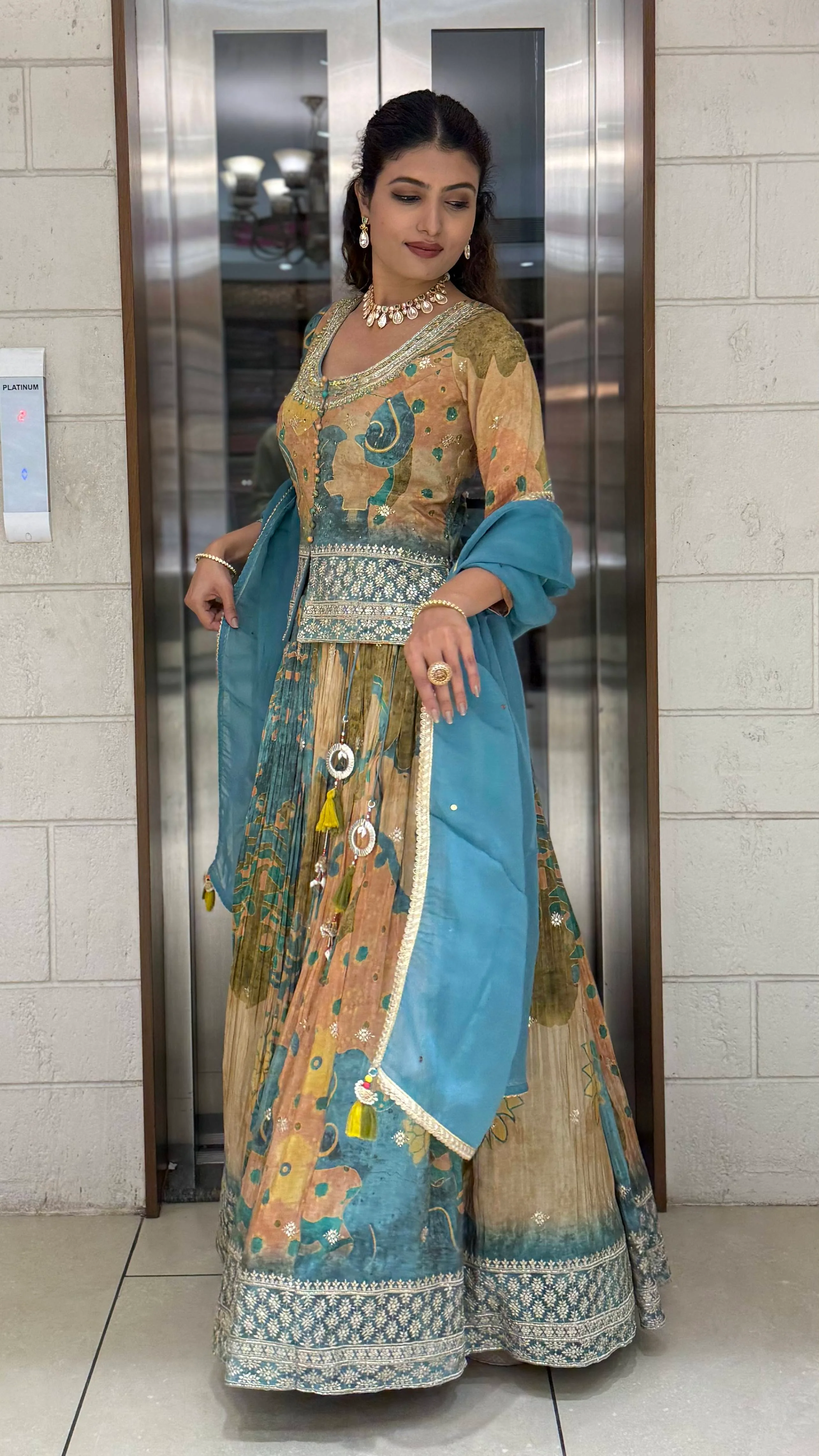 Teal Blue & Peach Printed Designer Peplum Lehenga Set with Flared Sleeves & Tassel Accents - Image 3