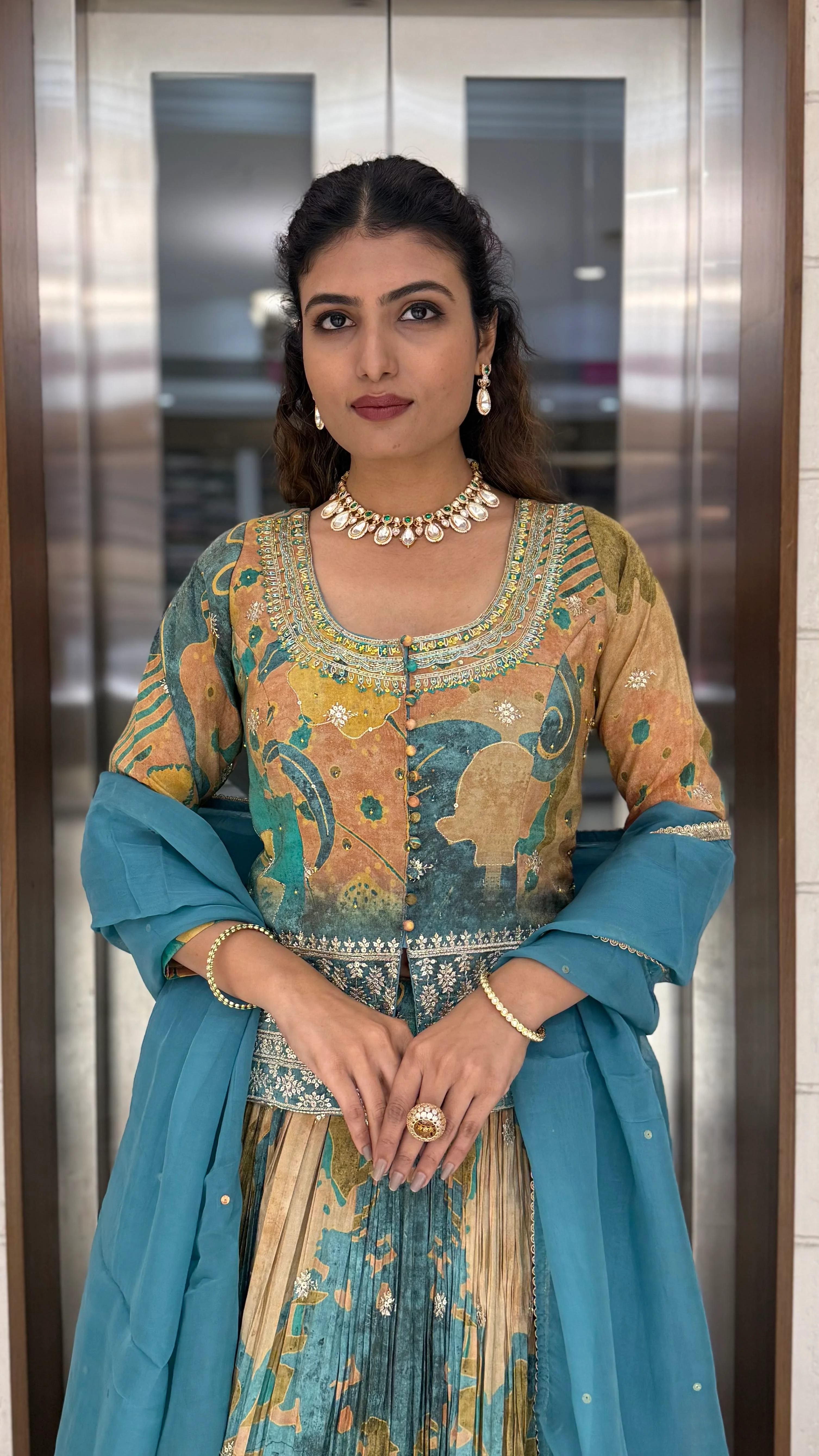 Teal Blue & Peach Printed Designer Peplum Lehenga Set with Flared Sleeves & Tassel Accents - Image 5