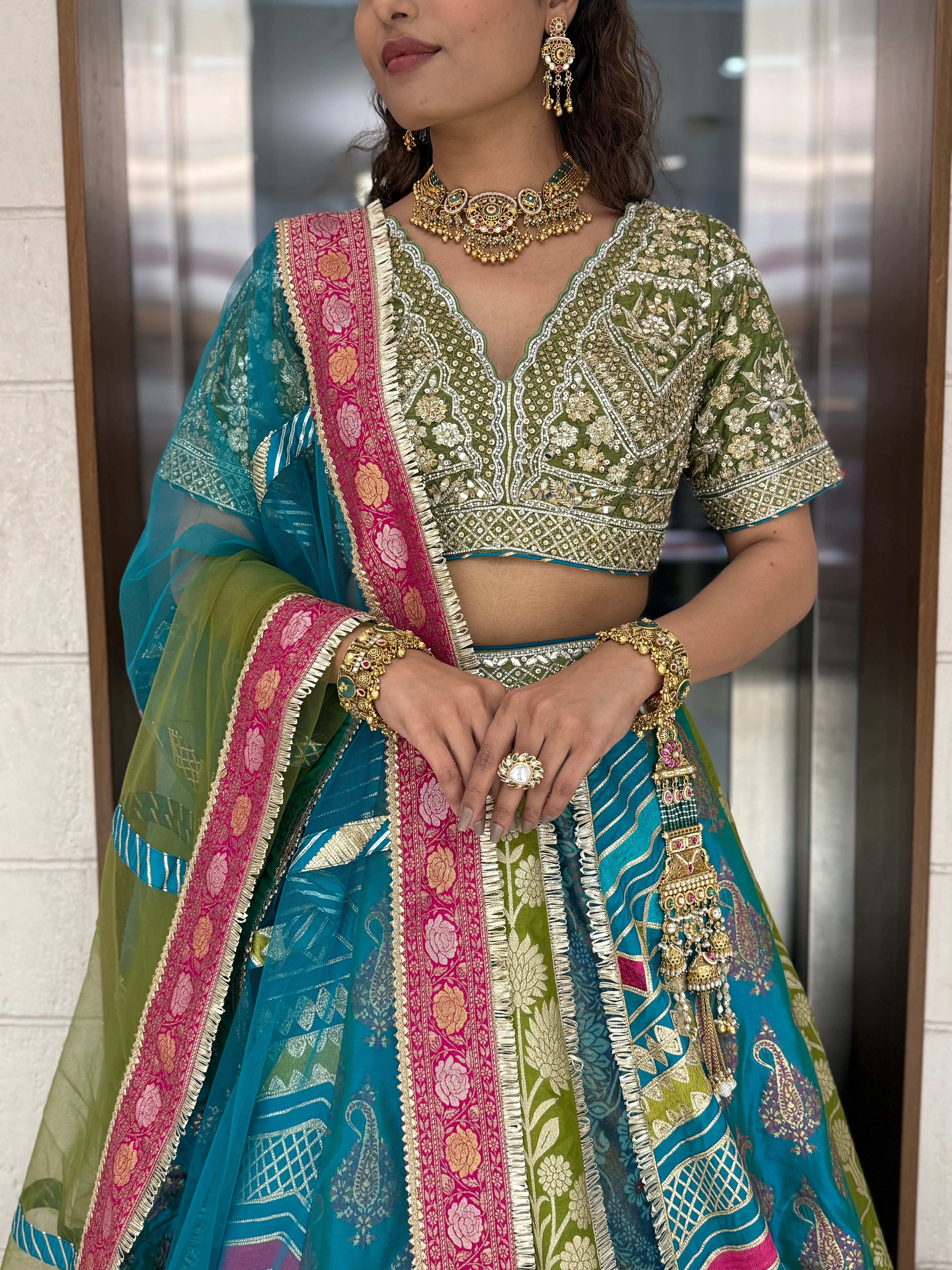 Teal & Olive Green Multicolor Patola Banarasi Lehenga Set with Heavy Hand-Embroidered Blouse - Image 2