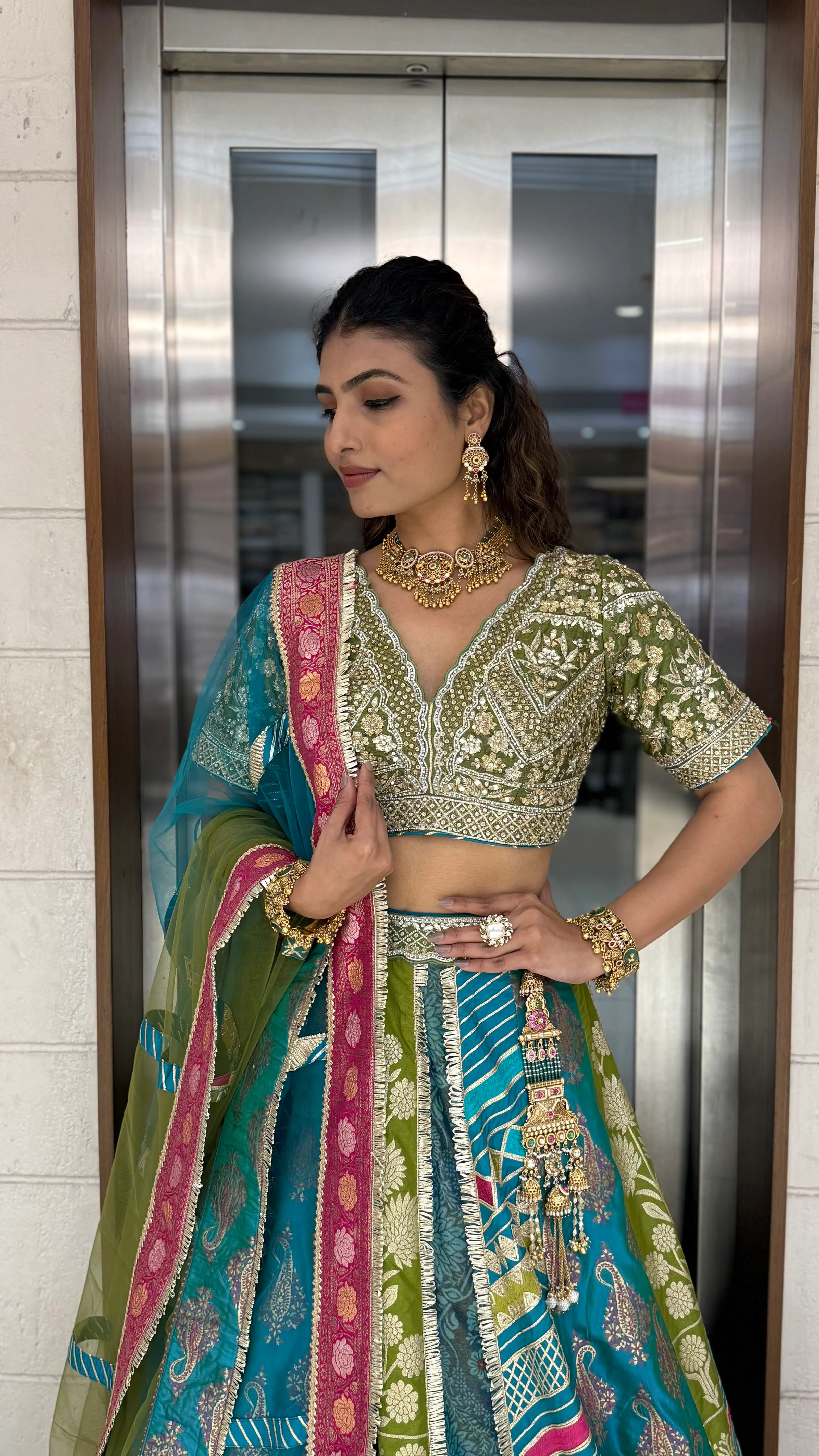 Teal & Olive Green Multicolor Patola Banarasi Lehenga Set with Heavy Hand-Embroidered Blouse - Image 4