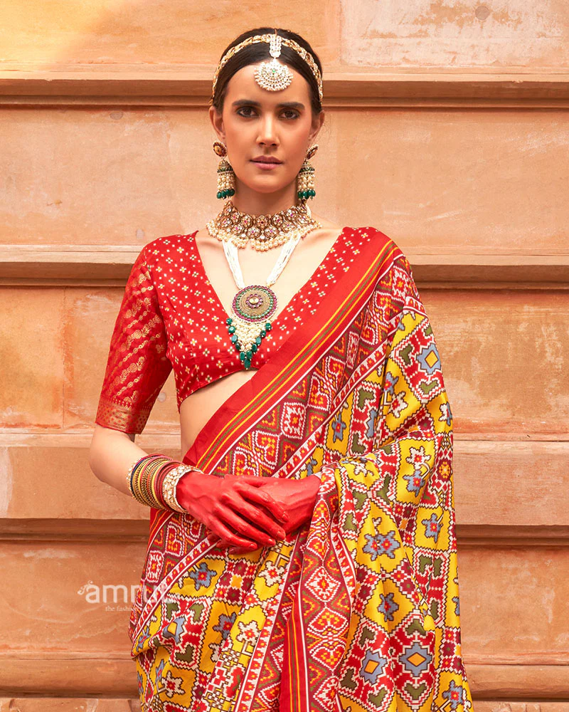 Yellow Patola Printed Saree with Red Zari Border and Unstitched Blouse - Image 2